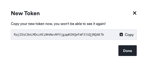 New Token dialog showing the generated token value with a Copy button